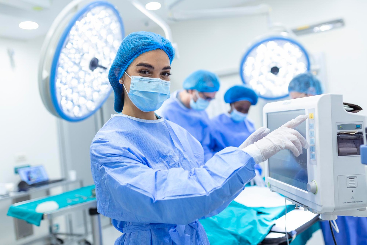 A surgeon at work in an operating theatre